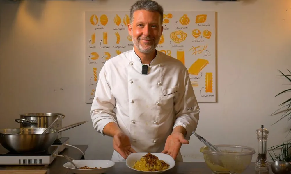 Chef Marco presenting a traditional carbonara recipe, likely for a cooking class or blog post